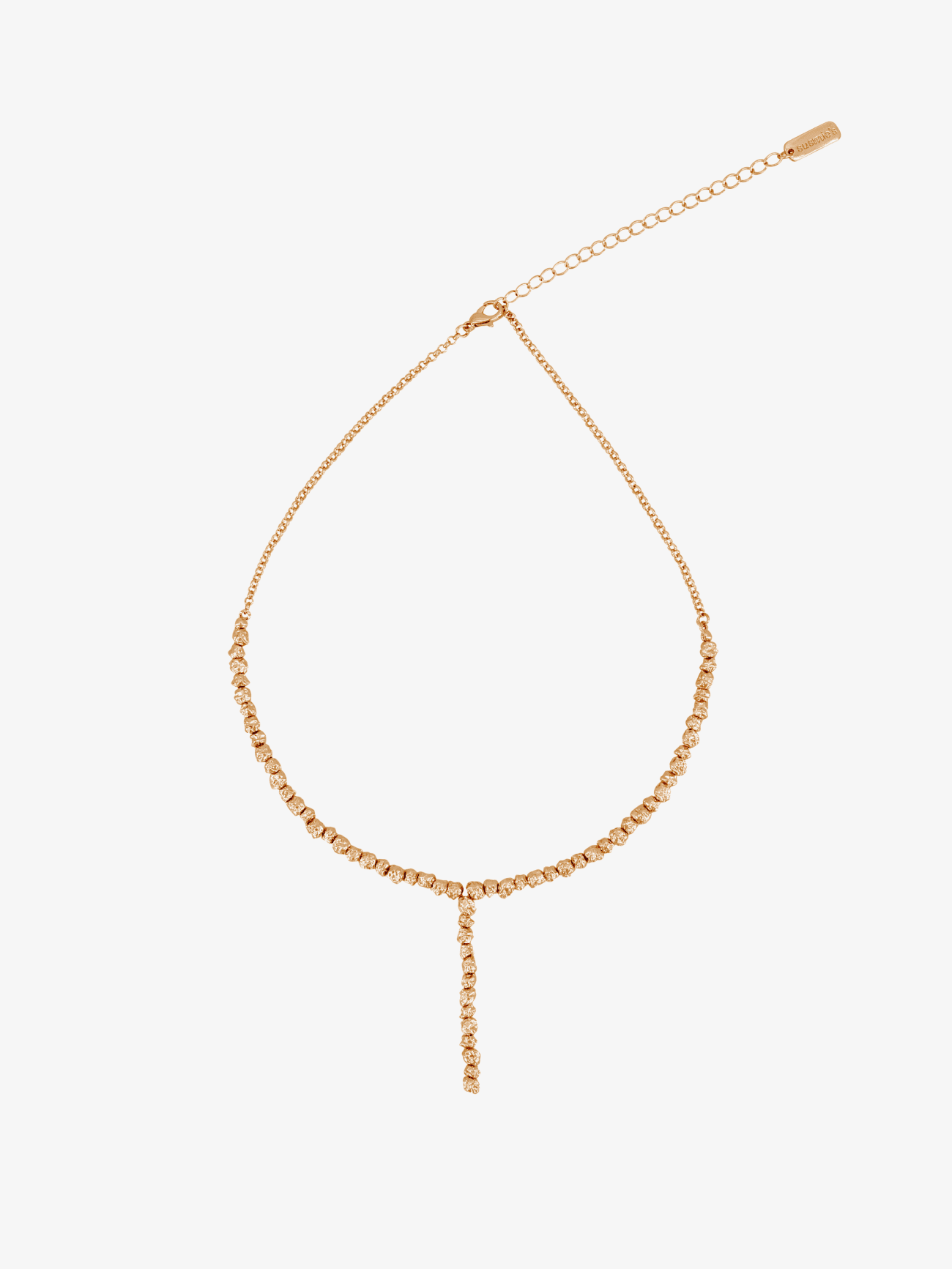 Gold beaded chain anklet with adjustable extender and dangling charm detail in rose gold finish