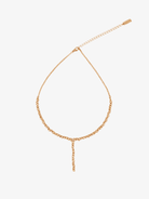 Gold beaded chain anklet with adjustable extender and dangling charm detail in rose gold finish
