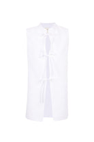 White sleeveless blouse with tie-front cutout detail and sheer fabric overlay