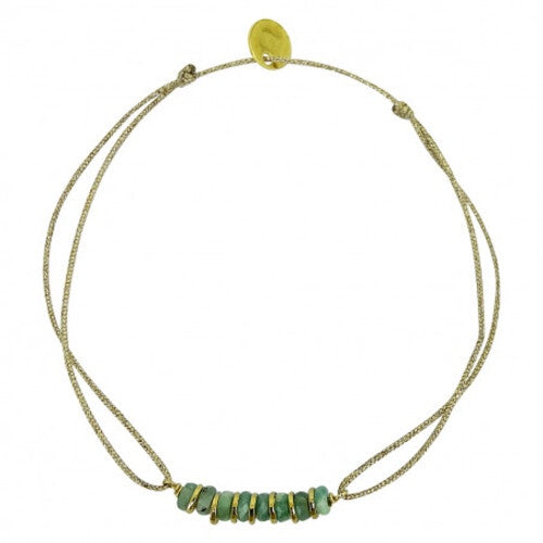 Delicate gold double-strand bracelet with turquoise blue beaded centerpiece and adjustable closure