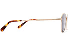 Gold-tone aviator sunglasses with tortoiseshell temples and gray lenses, shown from side angle on white background