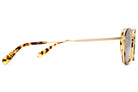 Tortoiseshell sunglasses with gold metal temples and square frames shown from side angle on white background