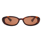 Oval tortoiseshell sunglasses with brown tinted lenses and retro-inspired frame design