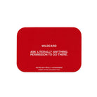 Red rounded rectangular card from We're Not Really Strangers Honest Dating Expansion Pack with white text reading Wildcard