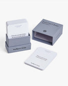 Card deck set with gray box containing white question cards labeled Let's Get Closer Team Edition by Intelligent Change