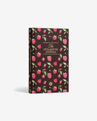 The Five Minute Journal with dark brown cover featuring pink raspberries and green leaves pattern with gold text