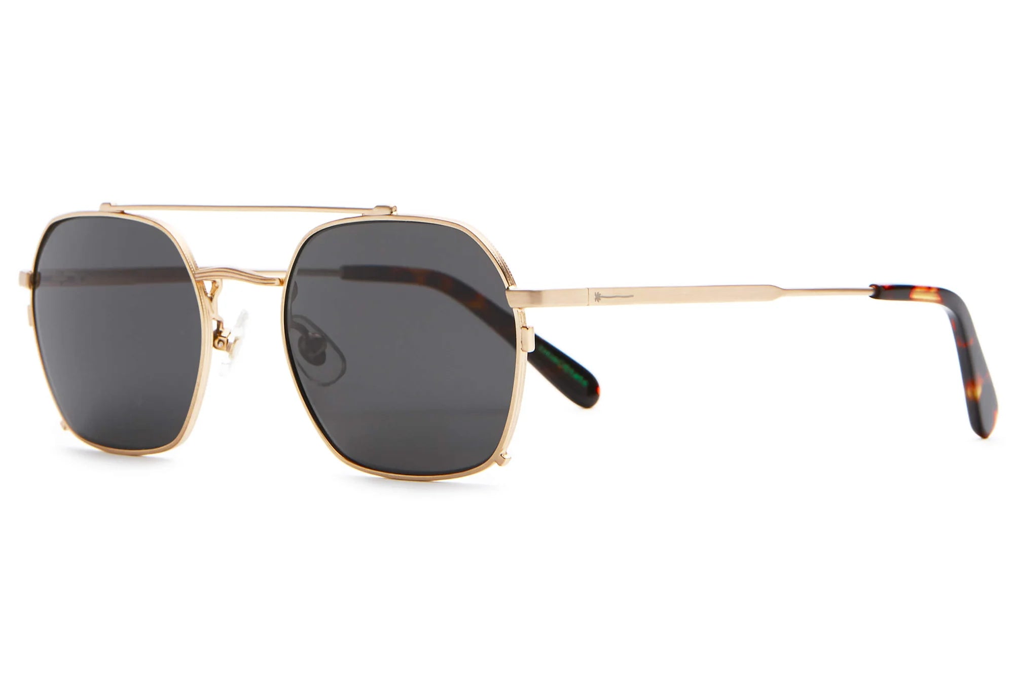 Gold-framed sunglasses with dark lenses on a white background