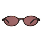 Oval tortoiseshell sunglasses with brown tinted lenses and minimalist frame design on white background