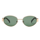 Sunglasses with gold frame and green lenses on a white background