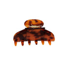 Tortoiseshell brown hair claw clip with metal clasp closure and curved teeth design