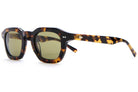 Tortoiseshell acetate square sunglasses with green-tinted lenses and silver rivet details on temples