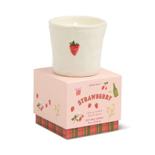 Cream ceramic planter pot with small red strawberry emblem on pink plaid gift box