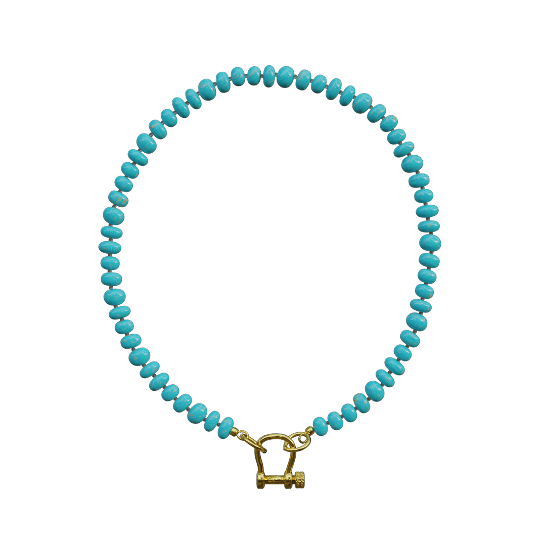 Turquoise beaded bracelet with gold-tone horseshoe clasp and natural stone variations