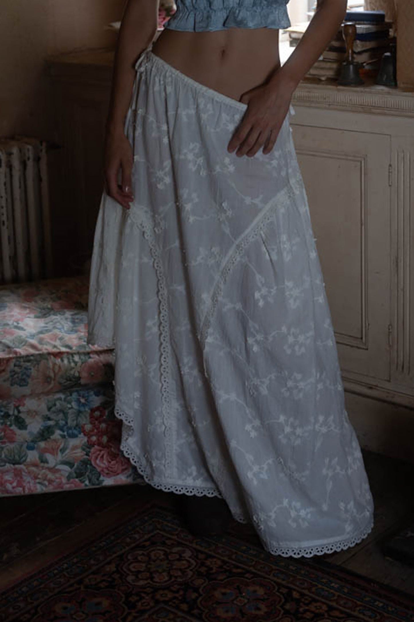 Light blue floral maxi skirt with eyelet lace trim and elastic waistband in cotton fabric