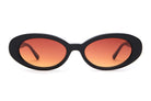 Black oval frame sunglasses with orange gradient lenses and thick retro-style acetate construction